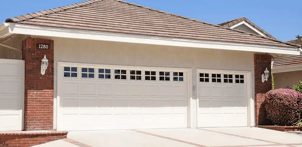 Residential garage door repair service for a double garage door in Newark, NJ