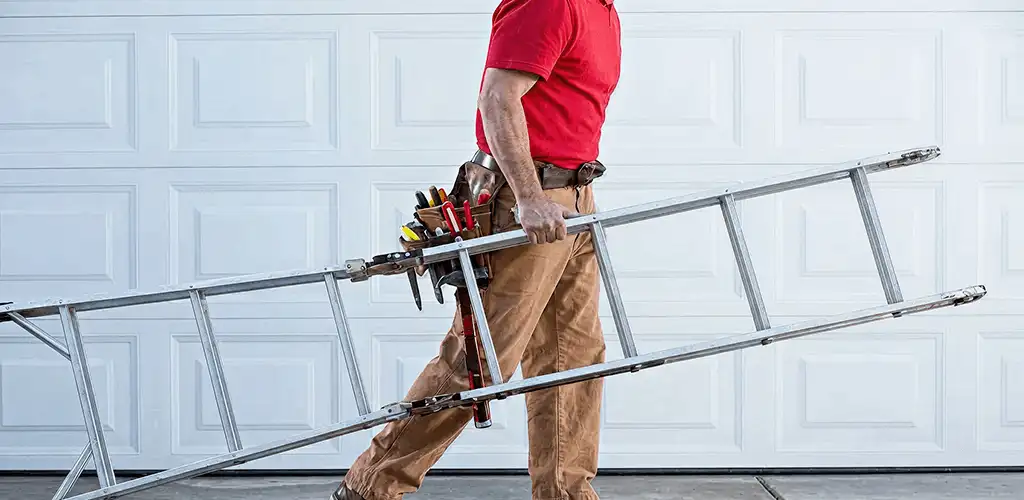 Garage door repair technician arriving with tools and ladder in Newark, NJ